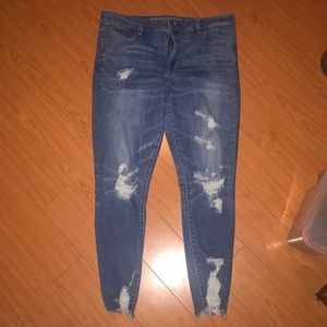 Distressed high rise jeans